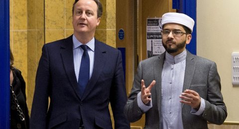 UK government cuts ties to imam after Muslim film protests