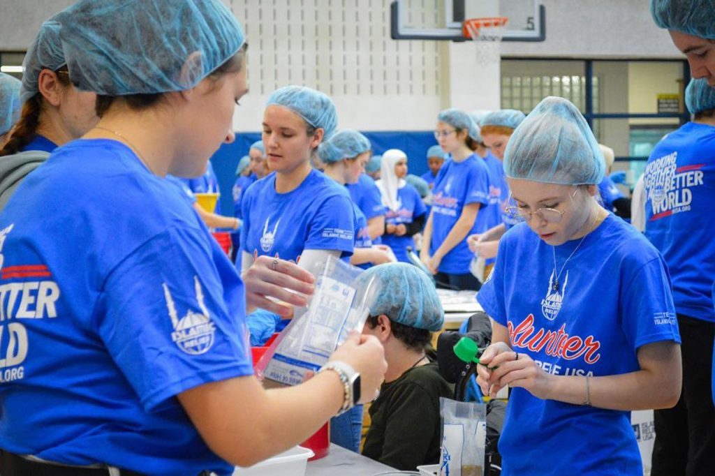 West Virginia Muslim students pack 30K meals to help less fortunate.
