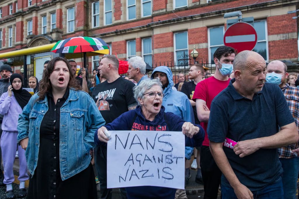 ‘Love will prevail’: how a far-right rally in Liverpool was defused