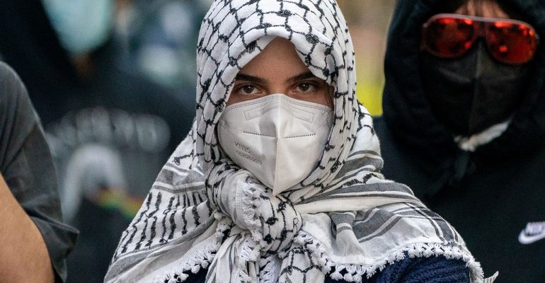 Charges dropped against pro-Palestinian protester arrested under mask ban for wearing a keffiyeh